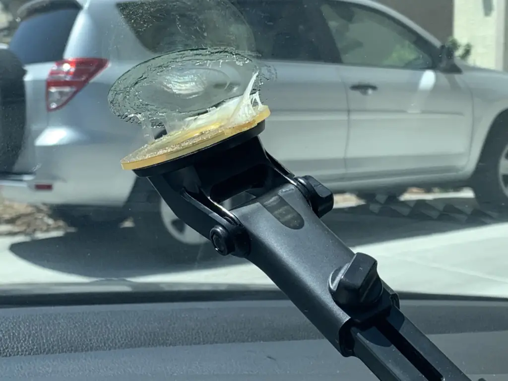 how to remove melted suction cup from windshield